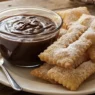 Coppetta di sanguinaccio al cioccolato fondente servito con chiacchiere di Carnevale