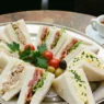 Tramezzini misti vassoio bar storia 100 anni.